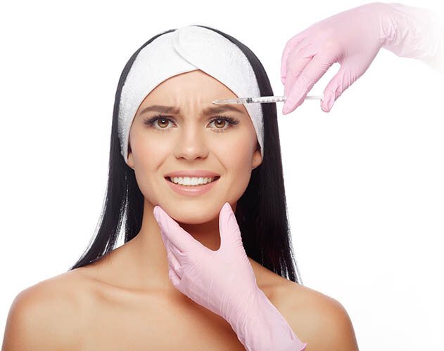 Woman Being Injected With Jeuveau For Frown Lines