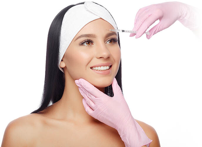 Woman Being Injected With Xeomin For Frown Lines